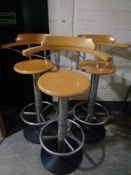 A set of three contemporary beech and metal bar armchairs