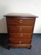 A Stag Minstrel four drawer bedside chest