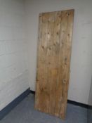 A folding wooden trestle table