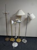 Five assorted continental floor and angle poised lamps