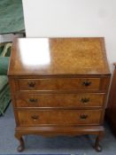 A walnut Queen Anne style writing bureau