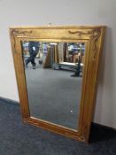 A contemporary gilt framed Art Nouveau style bevel edged mirror