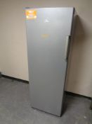 An Indesit upright freezer