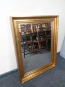 A gilt framed mirror
