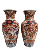A pair of 19th century Japanese Imari vases, height 30 cm.