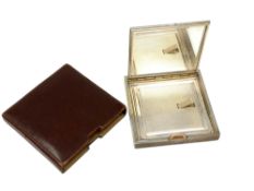 An Art Deco silver compact with engine turned decoration, David Sutton & Sons, London,