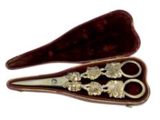 A pair of ornate Georgian silver-gilt grape scissors, maker CR, length 19cm,