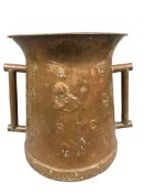 An eighteenth century twin handled vessel,