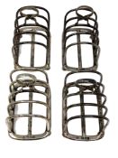A near-set of four silver five-bar toast racks, William Hutton & Sons Ltd, London 1904,