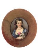 A fine early 19th century portrait miniature depicting a lady wearing a blue dress holding a small