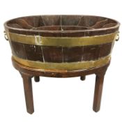 A George III mahogany brass bound cellarette, with compartmental interior, on stand, height 53 cm,