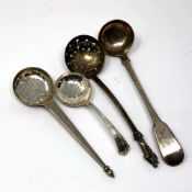 Four Georgian/Victorian silver sifting spoons,
