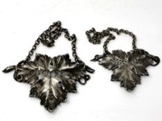 A fine pair of cast silver decanter labels for sherry and hock,