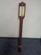 An antique stick barometer