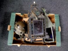 A box containing two antique lantern light fittings with coloured glass panels together with a