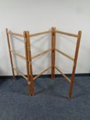 An antique pine folding clothes horse