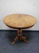 An Italian style pedestal occasional table