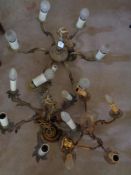 Three antique brass chandeliers