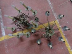 Two antique copper eight branch chandeliers