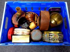 A box containing 20th century tins,