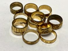 Twelve brass sample wedding bands