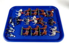 A quantity of mid 20th century hand painted military cavalry figures