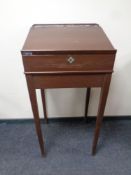 A 20th century painted pine clerk's desk on raised legs