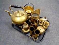 A tray containing antique and later metal wares to include ammunition shell cases, Indian vases,