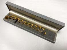 A decorative fancy link gold plated necklace