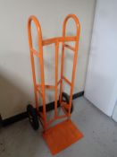 A heavy duty twin handled sack barrow with spring axle