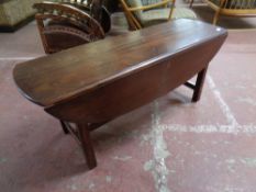 A flap sided coffee table