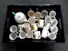 A crate containing PG Tips teapot and mugs,