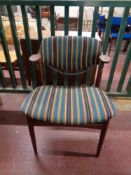A mid 20th century Danish teak elbow chair