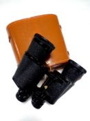 A set of leather cased Super Zenith 7 x 50 field glasses
