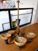 An antique five way brass chandelier