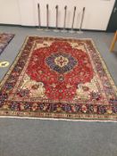 A Kirman carpet,
