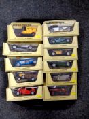 A tray containing 11 Matchbox Models of Yesteryear die cast delivery vehicles and classic cars,