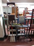 Two sets of folding steps together with a metal garden three tier folding shelf and a small