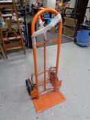 A heavy duty single handled sack barrow with spring axle