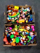 Two boxes containing a large quantity of miscellaneous toys to include McDonald's toys,