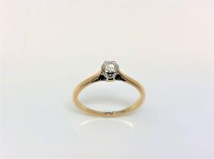 An 18ct gold solitaire diamond ring, the brilliant-cut stone weighing approximately 0.