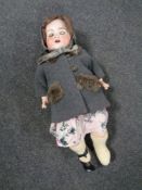 An Armand Marseilles porcelain doll