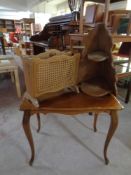 A walnut and beech occasional table on cabriole legs together with an oak corner wall shelf and an