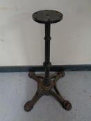 A cast iron pub table pedestal