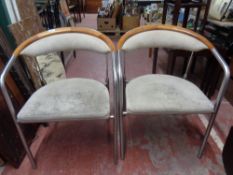 A set of four Hansen and Sorensen tubular metal and fabric armchairs