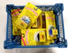A basket containing nine Matchbox Originals die cast vehicles on card