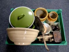 A wooden crate containing vintage kitchenalia to include mixing bowl, storage jars,