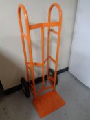 A heavy duty twin handled sack barrow with spring axle