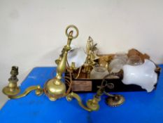 Three brass chandeliers together with two brass wall lights with glass shades