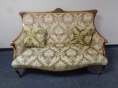 A 19th century mahogany framed salon settee in brocade fabric
